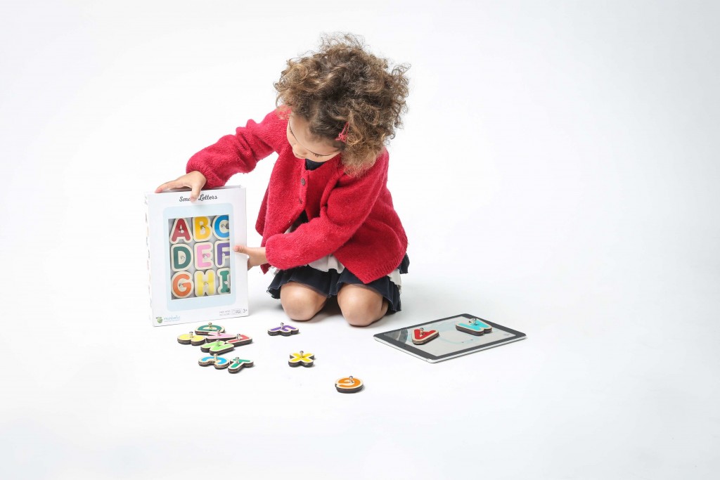 Girl playing smart letters